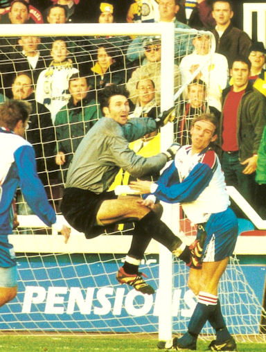 Goalkeeper Ian Feuer of the New England Revolution looks where to